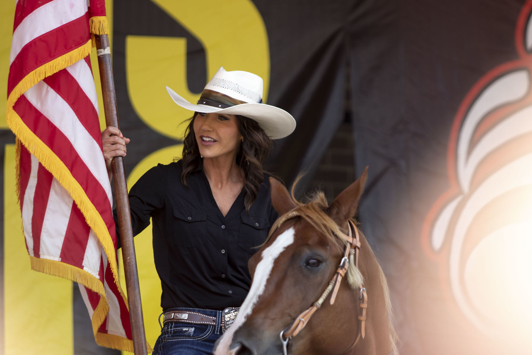 Noem on horse